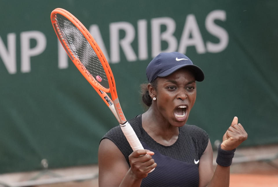 United States's Sloane Stephens celebrates after defeating Czech Republic's Karolina Muchova during their third round match on day 7, of the French Open tennis tournament at Roland Garros in Paris, France, Saturday, June 5, 2021. (AP Photo/Christophe Ena)