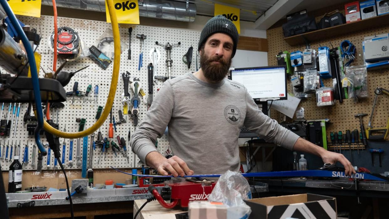 Mathieu Emond, manager of Greg Christie’s Ski and Cycle Works in Chelsea, Que., says the number of customers coming to the store has dropped significantly compared to last year. (Jean Delisle/CBC - image credit)