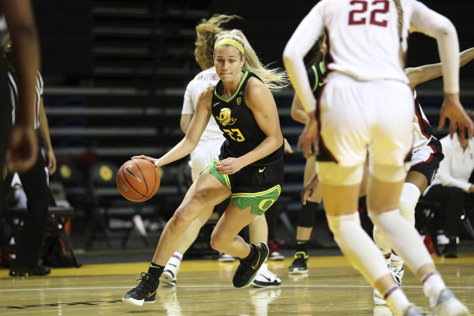 Oregon guard Maddie Scherr drives against Stanford during the first half of an NCAA college basketball game in Santa Cruz, Calif., Friday, Jan. 8, 2021. (AP Photo/Jed Jacobsohn)