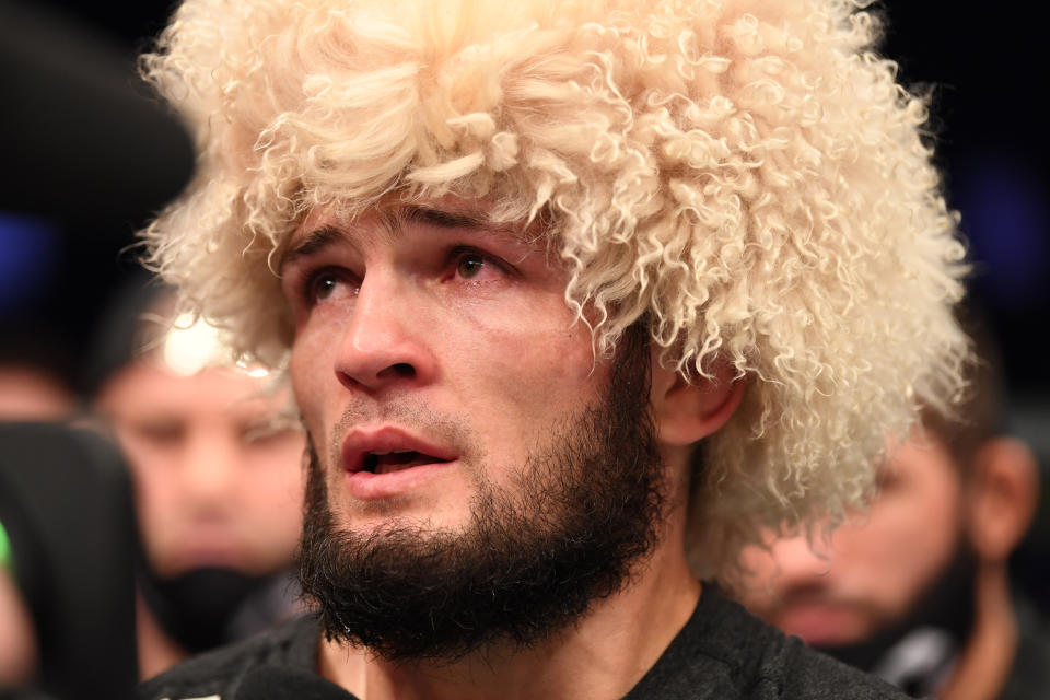 Khabib Nurmagomedov announces his retirement in the Octagon after his victory over Justin Gaethje in their lightweight title bout during the UFC 254 event on October 25, 2020 on UFC Fight Island, Abu Dhabi, United Arab Emirates.