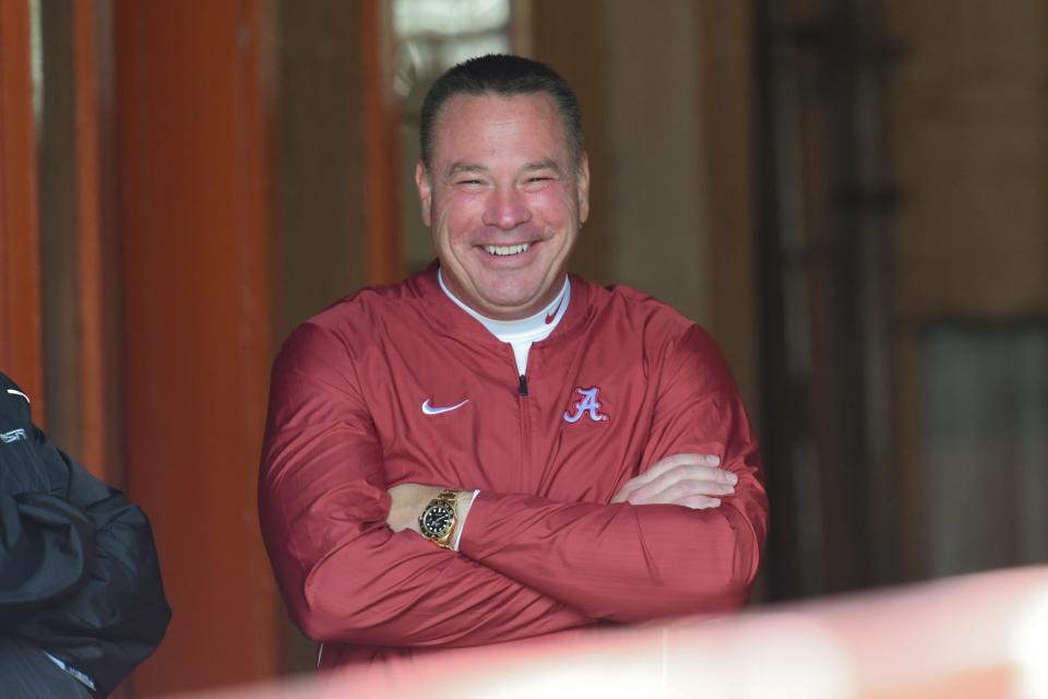 Crimson Tide analyst Butch Jones relaxes before the game against the Volunteers at Neyland Stadium.