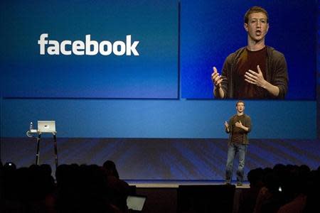 Mark Zuckerberg, founder and CEO of Facebook, delivers a keynote address at the company's annual conference in San Francisco, California July 23, 2008. REUTERS/Kimberly White