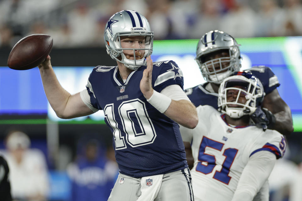 Dallas Cowboys quarterback Cooper Rush (10) passes against the New York Giants during the second quarter of an NFL football game, Monday, Sept. 26, 2022, in East Rutherford, N.J. (AP Photo/Adam Hunger)
