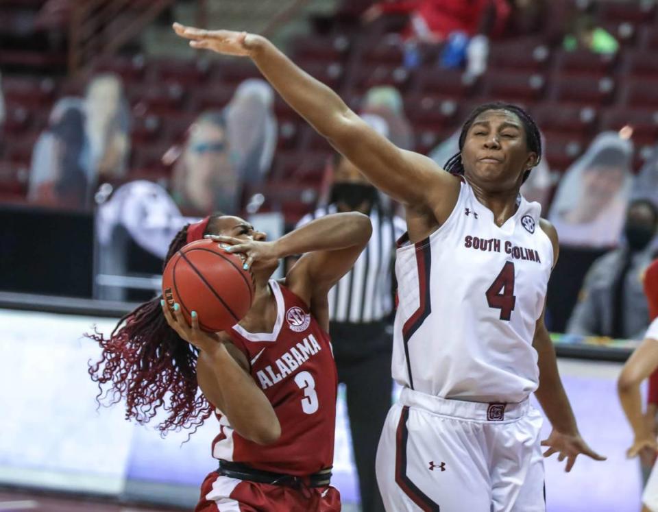 South Carolina Gamecocks forward Aliyah Boston (4) blocks a shot by Alabama guard Jordan Lewis (3) during the first half of action at the Colonial Life Arena. The Gamecocks beat Alabama, 87-63.