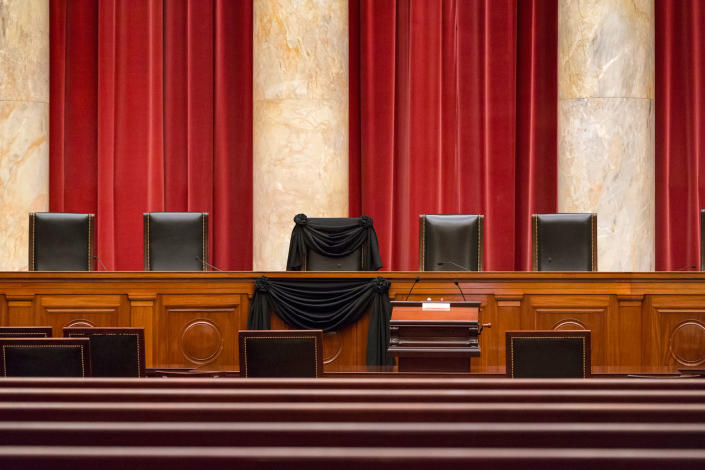 <p>FEB. 16, 2016 — Supreme Court Justice Antonin Scalia's courtroom chair is draped in black to mark his death as part of a tradition that dates to the 19th century at the Supreme Court in Washington. Scalia died Saturday at age 79. He joined the court in 1986 and was its longest-serving justice. (J. Scott Applewhite/AP) </p>