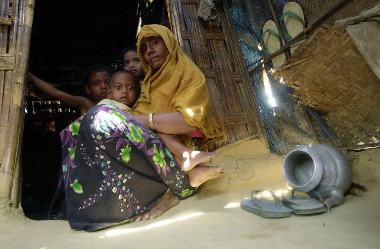 A Rohingya refugee mother and her children at Kutupalong refugee camp near Cox's Bazar