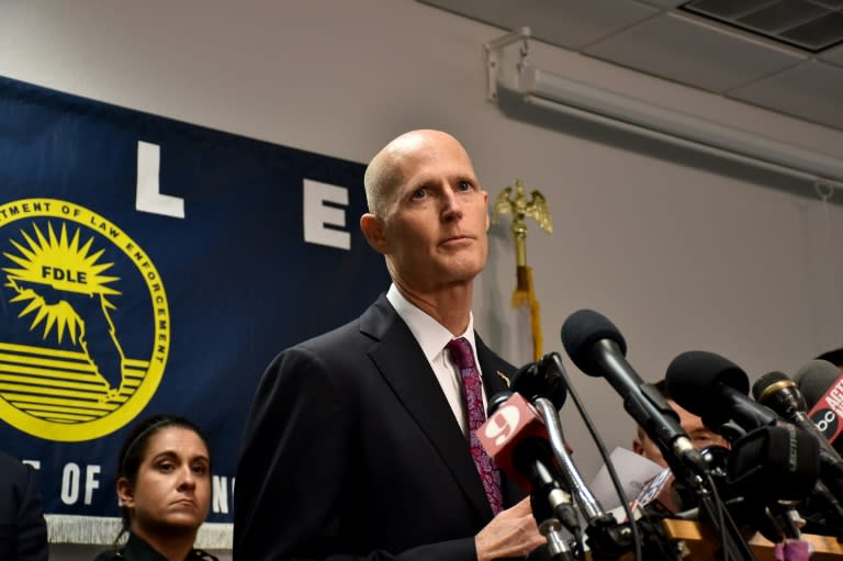 Florida Governor Rick Scott speaks to the media at a press conference in response to a deadly shooting at Club Blu in Fort Myers, Florida on July 25, 2016