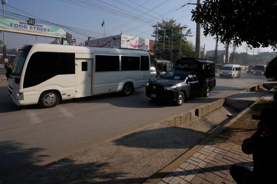 A convoy of security vehicles are escorting the England cricket team during their three-Test series in Pakistan (Anjum Naveed-AP) (AP)