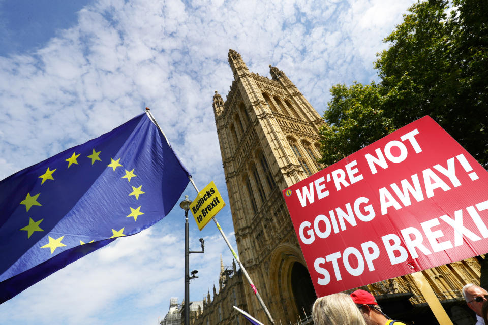 Anti-Brexit protesters outside the Houses of Parliament. Prime Minister Boris Johnson is seeking a suspension of Parliament ahead of a Queen's Speech on October 14. Suspending Parliament will reduce the time for opponents to schedule Parliamentary business before the Brexit deadline. (Photo by Aaron Chown/PA Images via Getty Images)