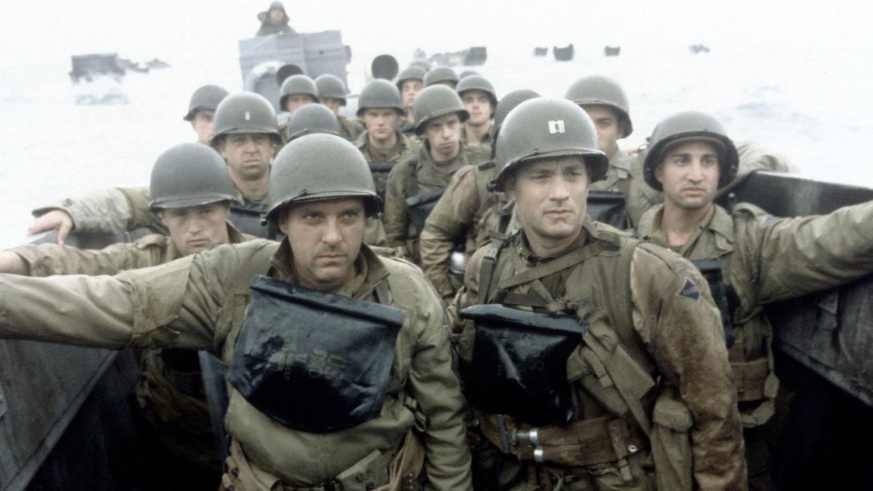  A split image of Ed Harris in Enemy at the Gates and Tom Hanks in Saving Private Ryan 