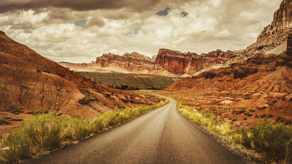 <p><strong>The Drive:</strong> The “Scenic Drive” through <a href="https://www.tripadvisor.com/Attraction_Review-g143017-d212117-Reviews-Capitol_Reef_National_Park-Capitol_Reef_National_Park_Utah.html" rel="nofollow noopener" target="_blank" data-ylk="slk:Capitol Reef National Park;elm:context_link;itc:0;sec:content-canvas" class="link ">Capitol Reef National Park</a></p><p><strong>The Scene:</strong> While you can certainly explore this national park by hiking or horseback riding, we recommend taking it in via the comforts of your car. Drive through the heart of this 100-mile park on the “Scenic Drive” route, which begins at the visitor’s center. Though it’s a relatively short drive (less than 10 miles), you should expect to spend several hours on it if you want to see all eleven park landmarks on the way. And if you love what you see, you can extend your trip by driving the Cathedral Valley Loop.</p><p><strong>The Pit-Stop:</strong> Make a quick stop at <a href="https://www.tripadvisor.com/Attraction_Review-g143017-d3475336-Reviews-Capitol_Gorge_Trail-Capitol_Reef_National_Park_Utah.html" rel="nofollow noopener" target="_blank" data-ylk="slk:Capitol Gorge;elm:context_link;itc:0;sec:content-canvas" class="link ">Capitol Gorge</a>, a nearby canyon that offers the perfect place for photos. </p>