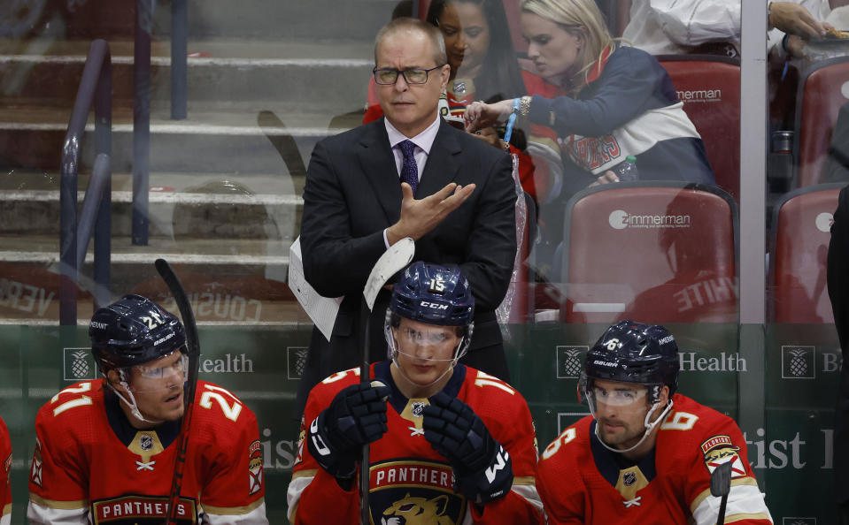 Florida Panthers head coach Paul Maurice, top, reacts during the second period of an NHL hockey game against the New York Ranger, Saturday, March 25, 2023, in Sunrise, Fla. (AP Photo/Rhona Wise)