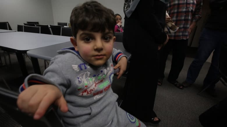 Syrian refugees say they're 'grateful' in spite of long wait in Toronto hotels