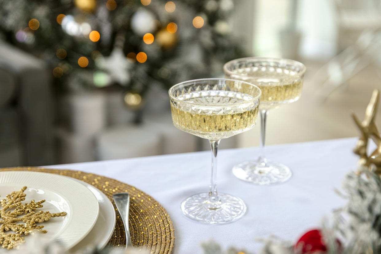  Christmas table with champagne coupe. 