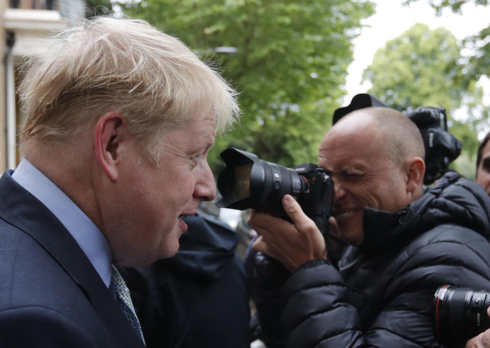 British Conservative Party lawmaker Boris Johnson leaves his home in London, Thursday, June 13, 2019. Boris Johnson, who ran London as mayor for eight years until 2016 and then became Britain's foreign secretary until his resignation last summer, is a confident if erratic Conservative Party star with a simple message: I'll sort out Brexit. (AP Photo/Frank Augstein)