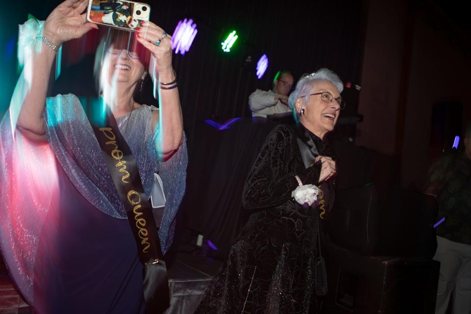 Ann Privrasky, right, dances after receiving a prom queen crown alongside fellow member of the class of 1962 Anne Mayes-Smith during North Eugene High School’s prom Saturday, May 4, 2024.