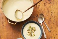 <p>This elegant side dish comes together with creamy cauliflower, heavy cream, and plenty of veggies. The almond topper adds the perfect amount of crunch.<br></p><p>Get the <a href="https://www.goodhousekeeping.com/food-recipes/healthy/a47225/cauliflower-soup-recipe/" rel="nofollow noopener" target="_blank" data-ylk="slk:Creamy Cauliflower Soup with Almond-Thyme Gremolata recipe" class="link "><strong>Creamy Cauliflower Soup with Almond-Thyme Gremolata recipe</strong></a>. </p>