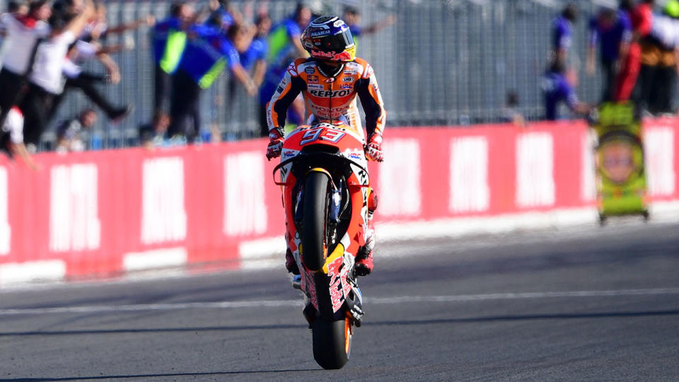 Repsol Honda Team Spanish rider Marc Marquez crosses the finish line to win the MotoGP Japanese Grand Prix. Pic: Getty