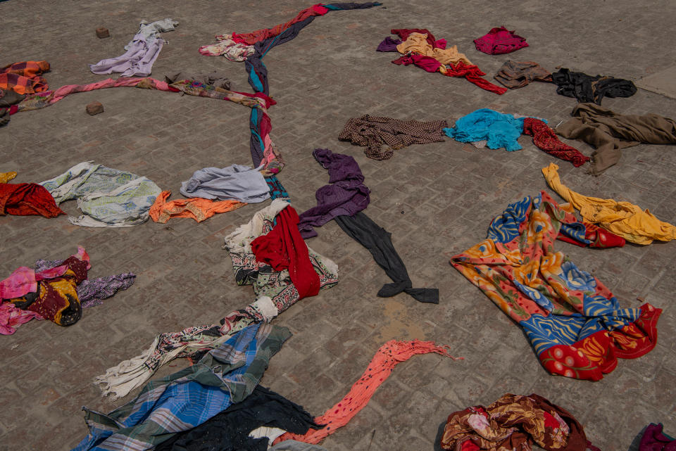 Clothes of the deceased lie on the terrace of a building within crematorium premises in New Delhi on April 27.<span class="copyright">Saumya Khandelwal for TIME</span>