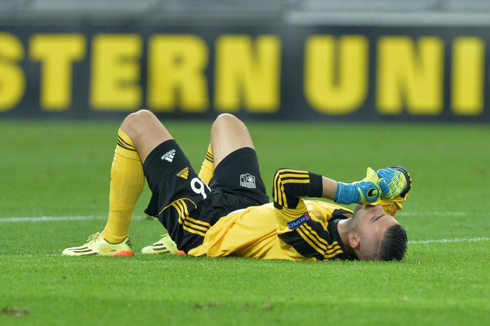 Olympic Lyon goalkeeper Anthony Lopes reacts at end of the Europa League quarterfinal soccer match between Juventus and Olympic Lyon at the Juventus stadium, in Turin, Italy, Thursday, April 10, 2014. (AP Photo/ Massimo Pinca)