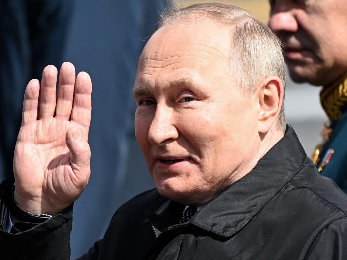 Russian President Vladimir Putin leaves Red Square after the Victory Day military parade in central Moscow.