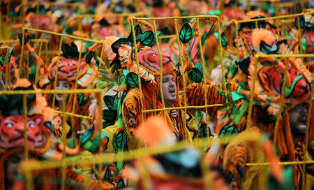 Revellers parade for the Aguia de Ouro samba school during the carnival in Sao Paulo, Brazil, February 25, 2017. REUTERS/Paulo Whitaker