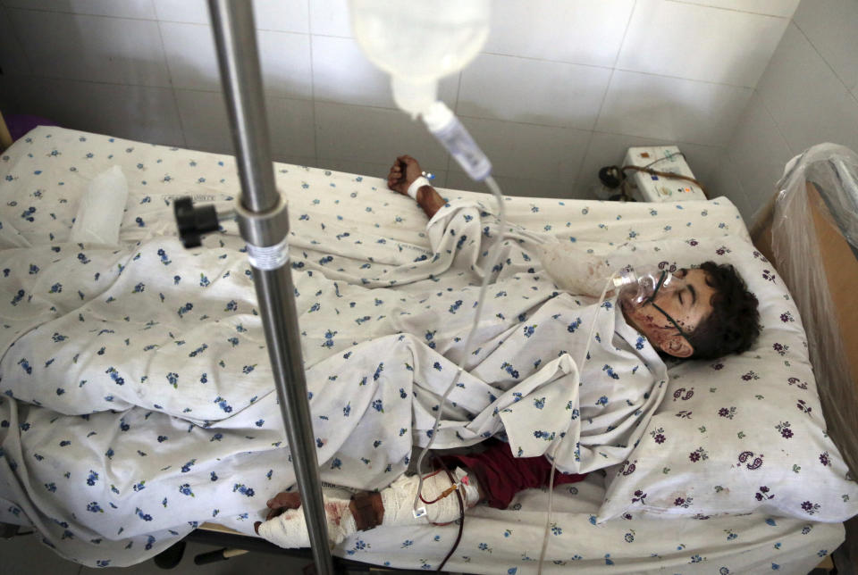 A wounded man receives treatment at a hospital after a suicide attack in northern Parwan province, Afghanistan, Tuesday, Sept. 17, 2019. The Taliban suicide bomber on a motorcycle targeted presidential guards who were protecting President Ashraf Ghani at a campaign rally in northern Afghanistan on Tuesday, killing over 20 people and wounding over 30. Ghani was present at the venue but was unharmed, according to his campaign chief. (AP Photo/Rahmat Gul)