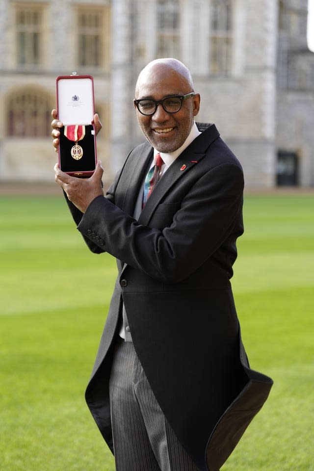 Sir Trevor Phillips during an investiture at Windsor Castle