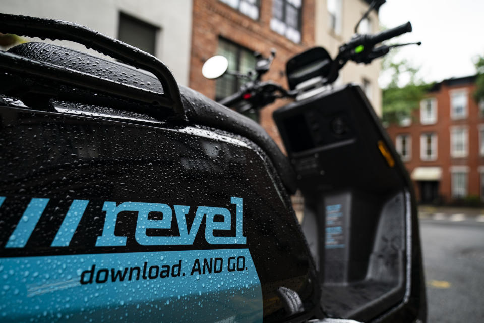 NEW YORK, NY - JUNE 18: A Revel brand moped sits parked on a residential street, June 18, 2019 in the Brooklyn borough of New York City. The ride-share moped company has deployed over 1,000 electric mopeds through Brooklyn and Queens. The fully electric mopeds top out at 30 miles per hour and are available to rent by the minute via smartphone. (Photo by Drew Angerer/Getty Images)