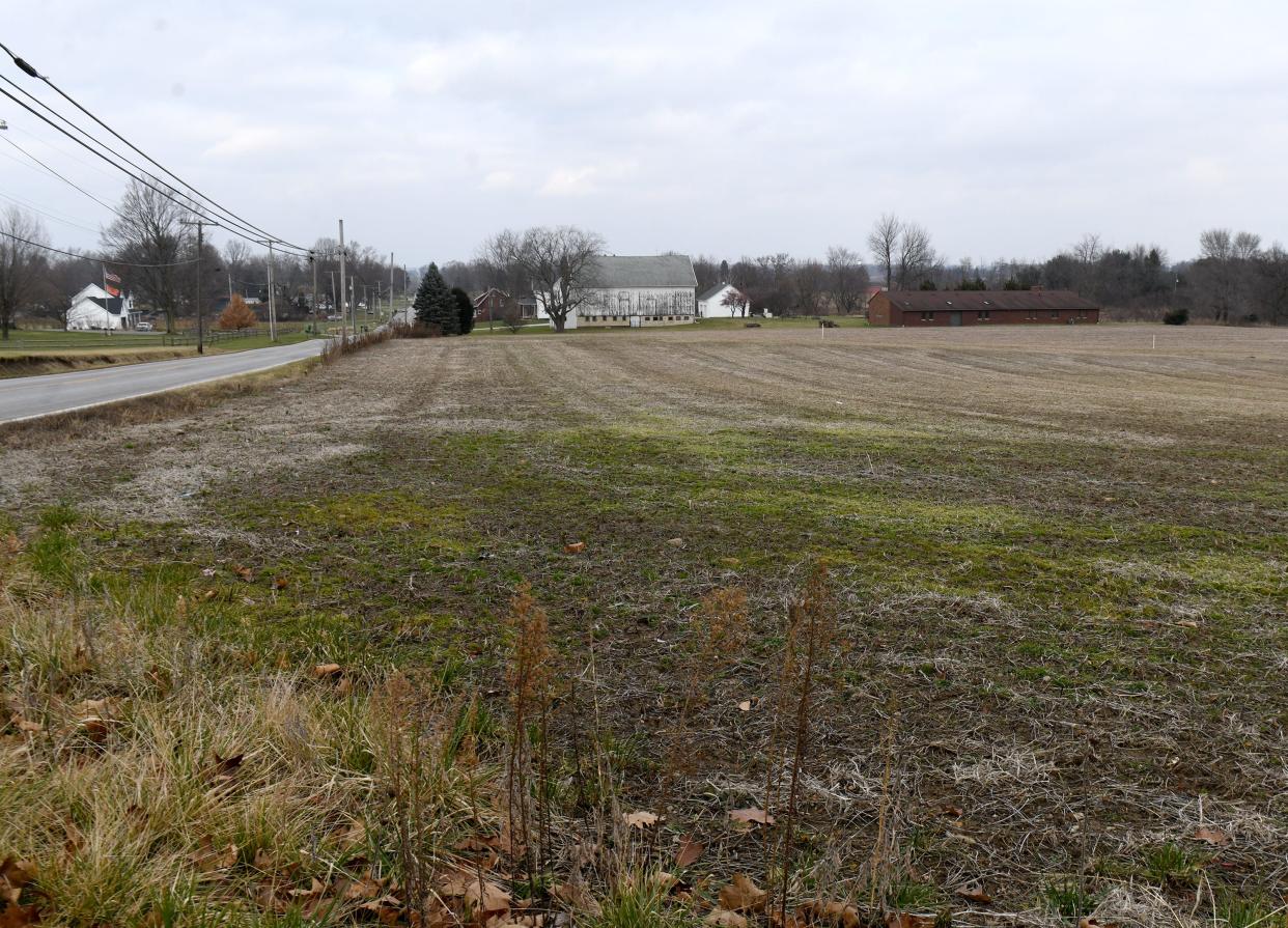 A new community park, known as Sukosd Park, will be developed southeast of Elaine Sukosd's former home at 1600 Broadway Ave. NE in Osnaburg Township.