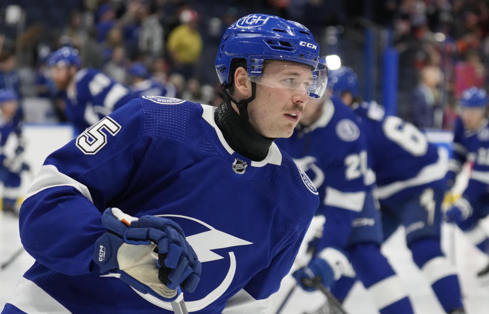 FILE - Tampa Bay Lightning left winger Cole Koepke wears a protective neck guard before an NHL hockey game against the Edmonton Oilers Saturday, Nov. 18, 2023, in Tampa, Fla. Koepke was en route to a minor league game with Syracuse of the AHL last month when he heard from a friend that Adam Johnson had been cut by a skate blade during a hockey game in Britain. The death of the 29-year-old former Pittsburgh Penguins player has not only forced the sport to re-examine safety regulations but prompted Koepke to the wear a turtleneck-style neck guard. (AP Photo/Chris O'Meara, File)