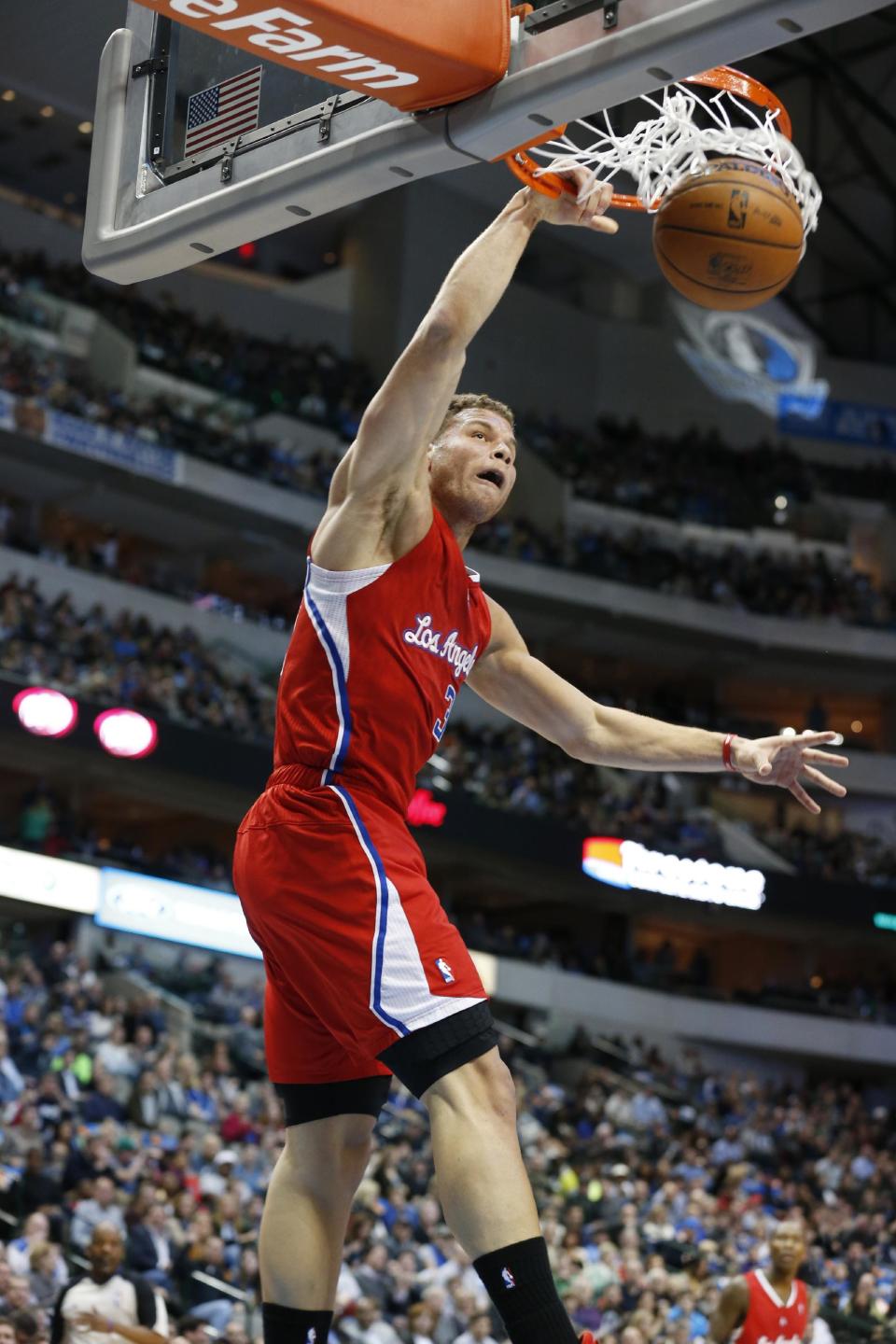 Los Angeles Clippers forward Blake Griffin dunks during the first half of an NBA basketball game against the Dallas Mavericks on Friday, Jan. 3, 2014, in Dallas. (AP Photo/Sharon Ellman)