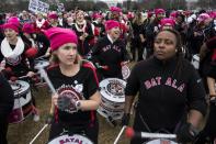 Roused by fiery speeches and led by women in pink "pussyhats," hundreds of thousands flooded Washington and cities across the US to protest President Donald Trump