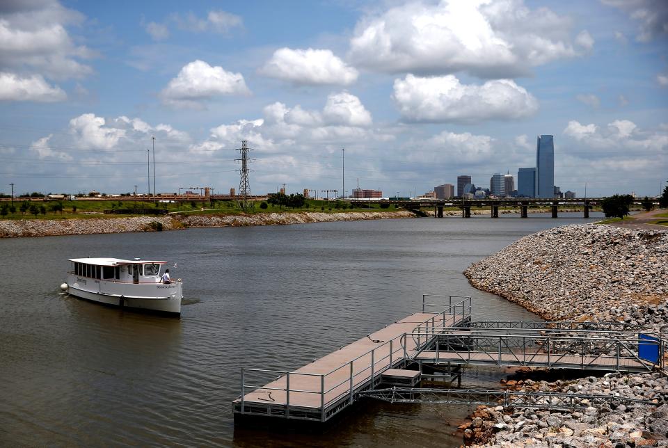 The Oklahoma River Cruises ferry arrives at the Stockyards Landing at the Oklahoma River in Oklahoma City in this 2021 photo.