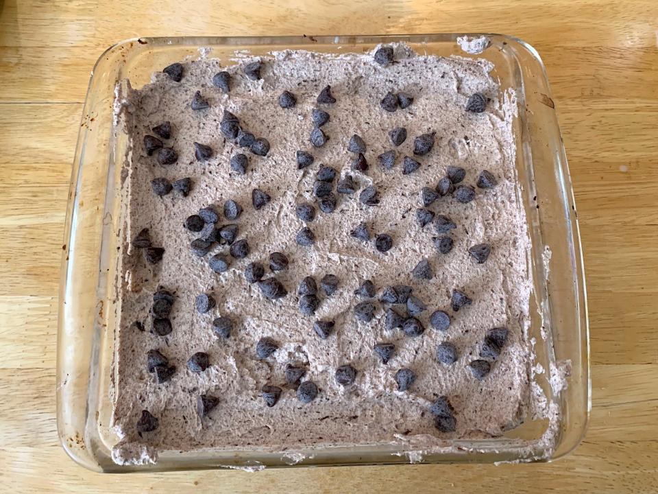 Chocolate chips on second layer of mousse for celebration cake