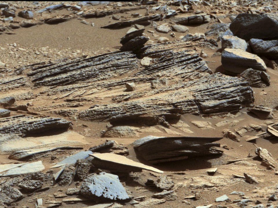 <p>An image from the Mast Camera (Mastcam) on NASA’s Mars rover Curiosity shows the surface of the planet with inclined layering known as cross-bedding in an outcrop called “Shaler” on a scale of a few tenths of a meter, or decimeters (1 decimeter is nearly 4 inches) in this NASA handout released January 15, 2013. (Photo: NASA/JPL-Caltech/MSSS/Reuters) </p>