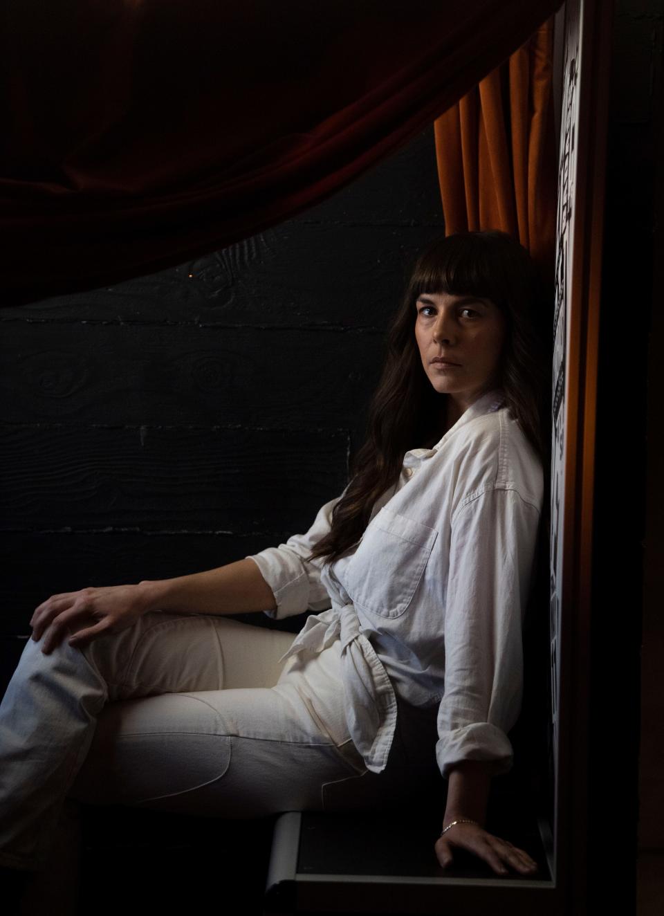 Madi Diaz poses in a photo booth at Brooklyn Bowl in Nashville on March 8. The singer-songwriter returned to Music City after a five-year stint in Los Angeles.