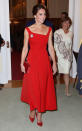 <p>The Duchess stunned in a fitted red dress by Preen for an evening reception in Canada. She finished the ensemble with a matching suede clutch and shoes.</p><p><i>[Photo: PA]</i> </p>
