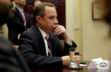 FILE PHOTO: White House Chief of Staff Reince Priebus listens as U.S. President Donald Trump meets with Republican Congressional leaders at the White House in Washington, U.S., June 6, 2017. REUTERS/Joshua Roberts/File Photo