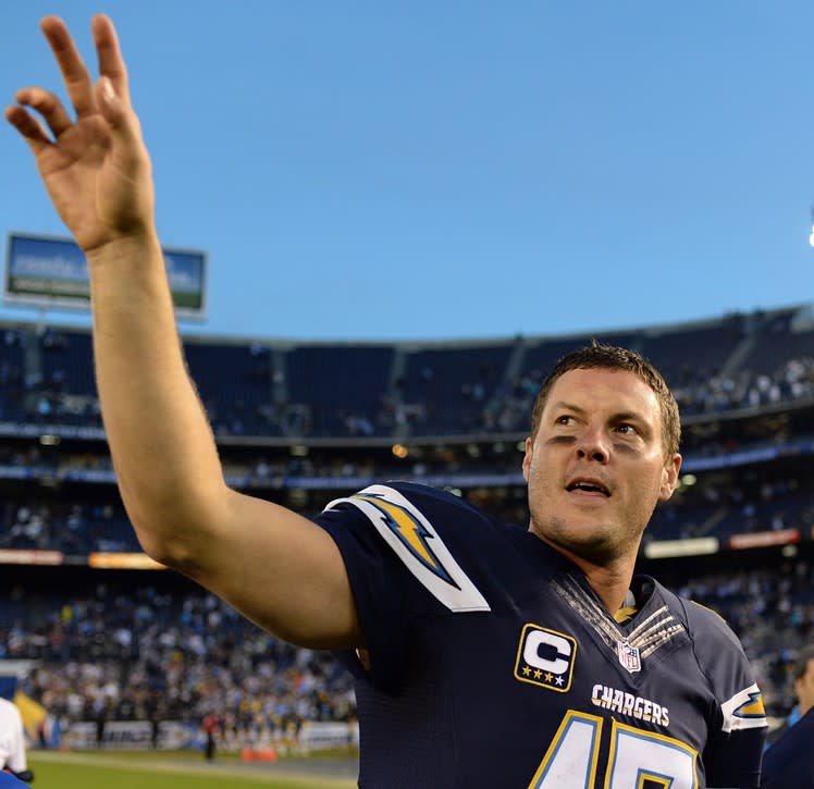 Dec 20, 2015; San Diego, CA, USA; San Diego Chargers quarterback Philip Rivers (17) waves to the fans after the Chargers beat the Miami Dolphins 30-14 at Qualcomm Stadium. Mandatory Credit: Jake Roth-USA TODAY Sports