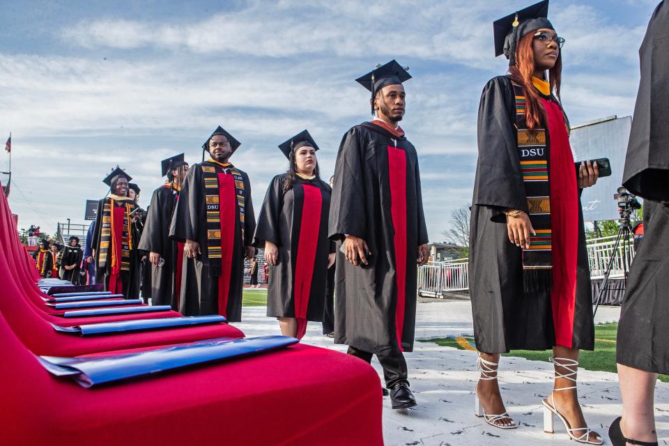 Graduating underclassmen file in for the Delaware State University 2023 commencement ceremony at Alumni Stadium in Dover, Friday, May 12, 2023.