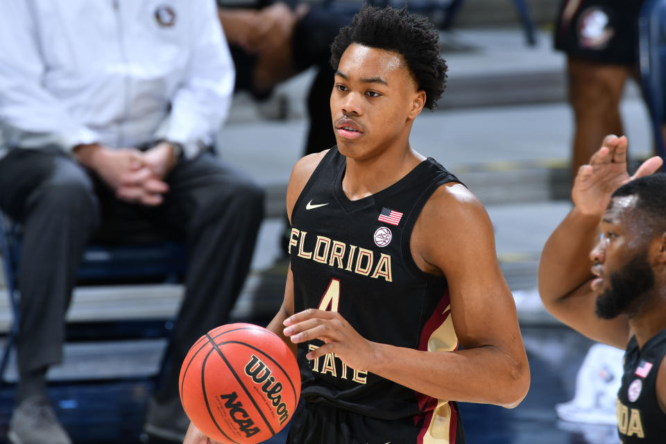 Mar 6, 2021; South Bend, Indiana, USA; Florida State Seminoles guard Scottie Barnes (4) dribbles in the first half against the Notre Dame Fighting Irish at the Purcell Pavilion. 