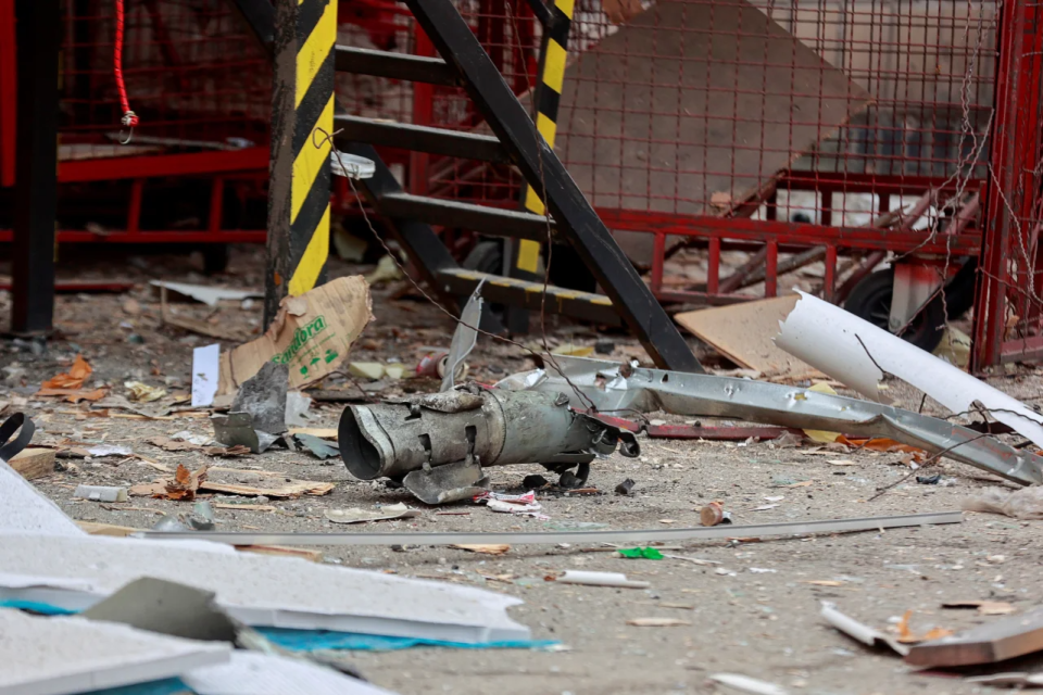 Debris of a rocket near a building destroyed by a Russian strike <span class="copyright">REUTERS/Serhii Nuzhnenko</span>