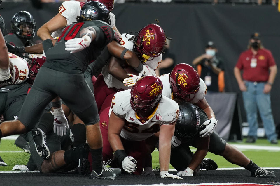 Iowa State running back Deon Silas (22) scores a touchdown against UNLV during the second half of an NCAA college football game Saturday, Sept. 18, 2021, in Las Vegas. (AP Photo/John Locher)