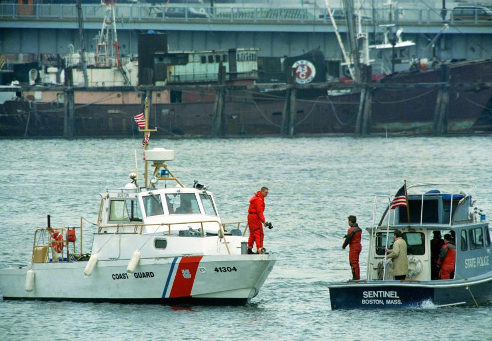 Boston Police and Coast Guard boats search the water for the body of Charles Stuart, who police believed jumped from the Tobin Bridge in Boston, Jan. 4, 1990. On Wednesday, Dec. 20, 2023, Boston Mayor Michelle Wu plans to formally apologize on behalf of the city to Alan Swanson and Willie Bennett for their wrongful arrests following the 1989 death of Carol Stuart, whose husband, Charles Stuart, had orchestrated her killing. Stuart blamed his wife’s killing — and his own shooting during what he portrayed as an attempted carjacking — on an unidentified Black gunman, leading to a crackdown by police in one of the city’s traditionally Black neighborhoods in pursuit of a phantom assailant.