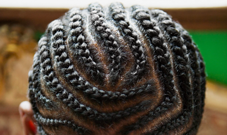 A school has backed down after a backlash about its braid ban on two black pupils [Photo: Getty]