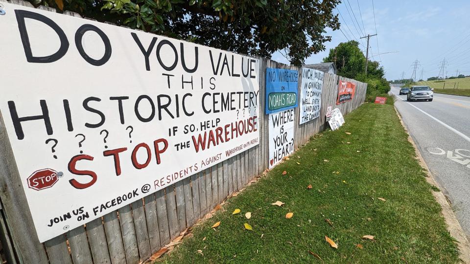 There are many signs on the York City side of Pennsylvania Avenue across the street from the site of a potential warehouse or other industrial development on May 23, 2023.