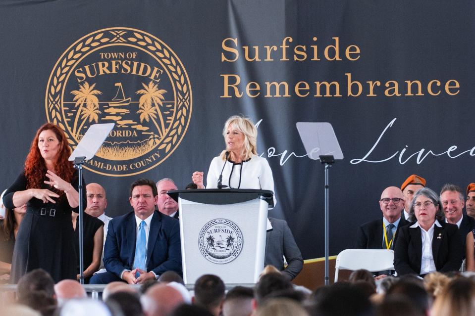 First lady Jill Biden speaks to the audience gathered at the former location of Champlain Towers South condo in Surfside, on Friday, June 24, 2022. Hundreds attended a public memorial at the former site of the towers, which was held in honor of the 98 victims of the deadly collapse. Friday marked the one-year anniversary of the tragedy.