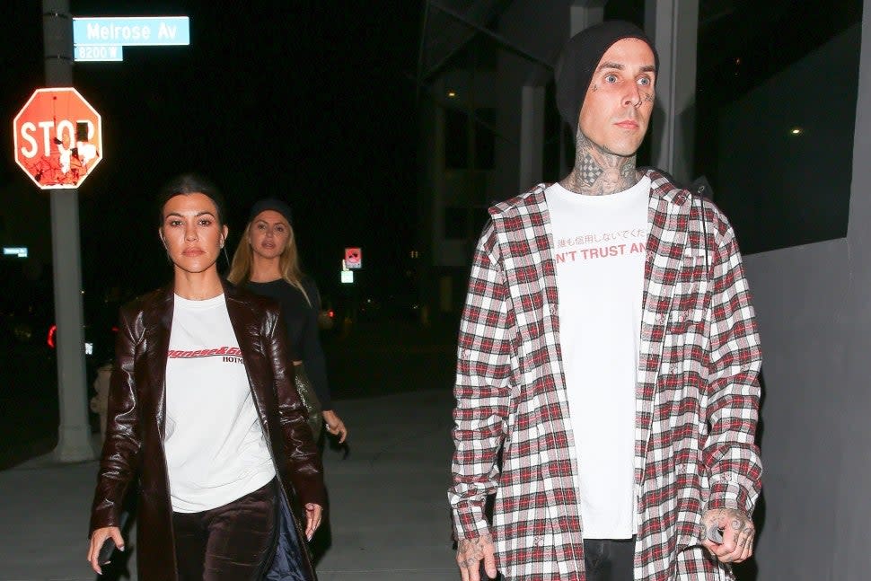 Kourtney Kardashain, Larsa Pippen, Travis Barker and Amanda Elise were seen arriving at Crossroads restaurant after church for dinner. Travis Barker was driving Kourtney Kardashian's Aston Martin.