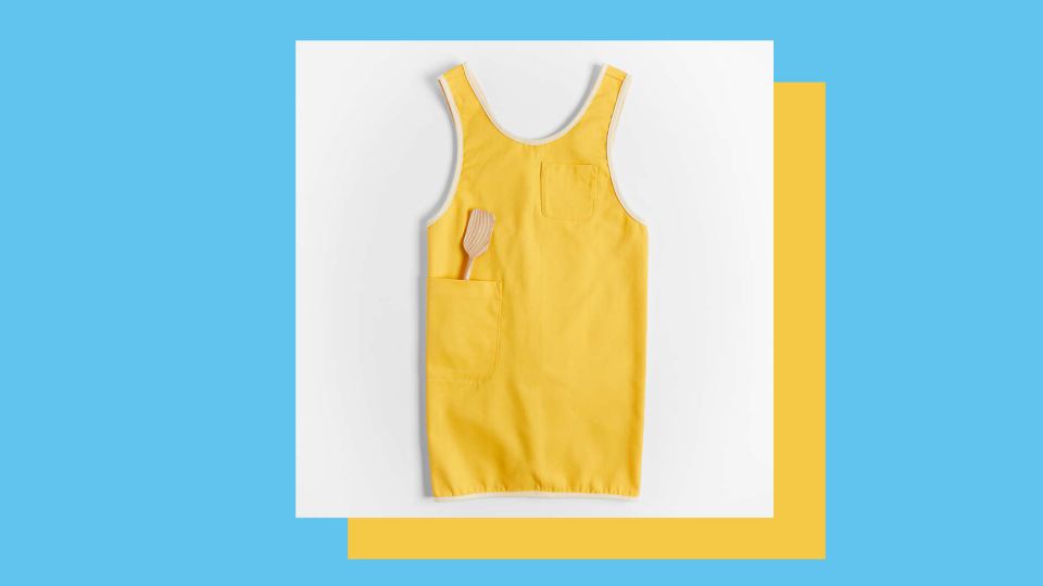 Keep your clothes clean—but don't sacrifice style—with this  Egg Yolk Yellow apron.